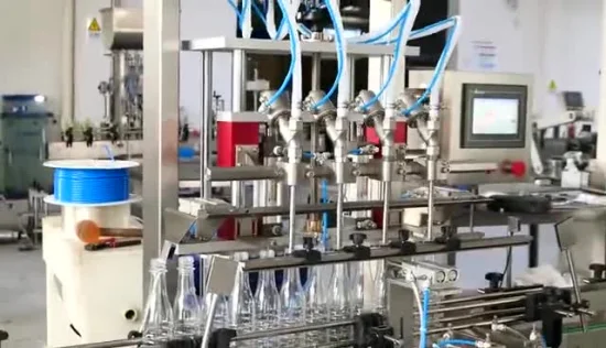 Riche expérience dans la conception d'usine Machine de remplissage automatique de bouteilles d'alcool par gravité